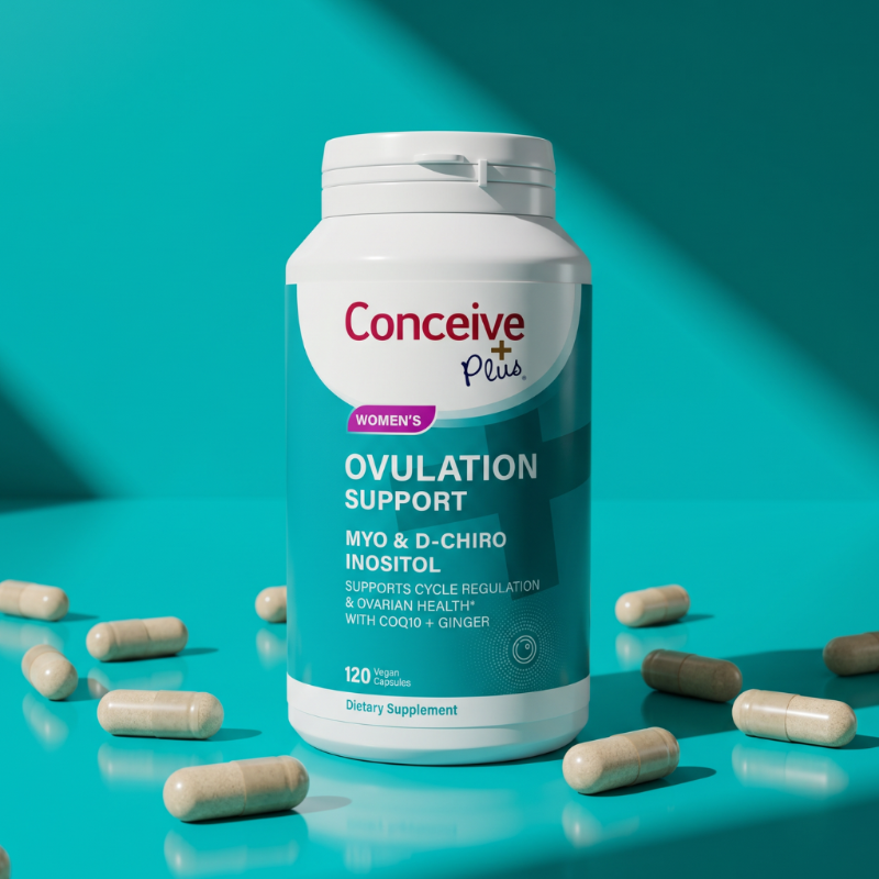 A white and teal bottle of Conceive Plus Women's Ovulation Support dietary supplement stands on a turquoise surface with scattered beige capsules around it. The Conceive Plus brand name is clearly visible on the front label.