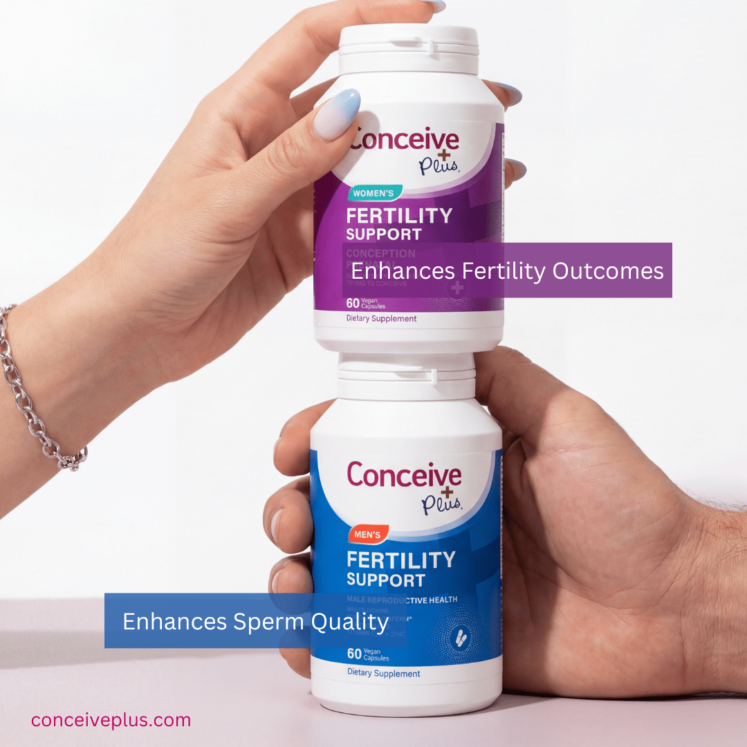 Two bottles of Conceive Plus fertility support supplements held by a person against a white background.