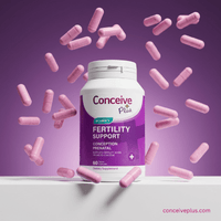 Conceive Plus fertility support supplement bottle with pink pills on a purple background